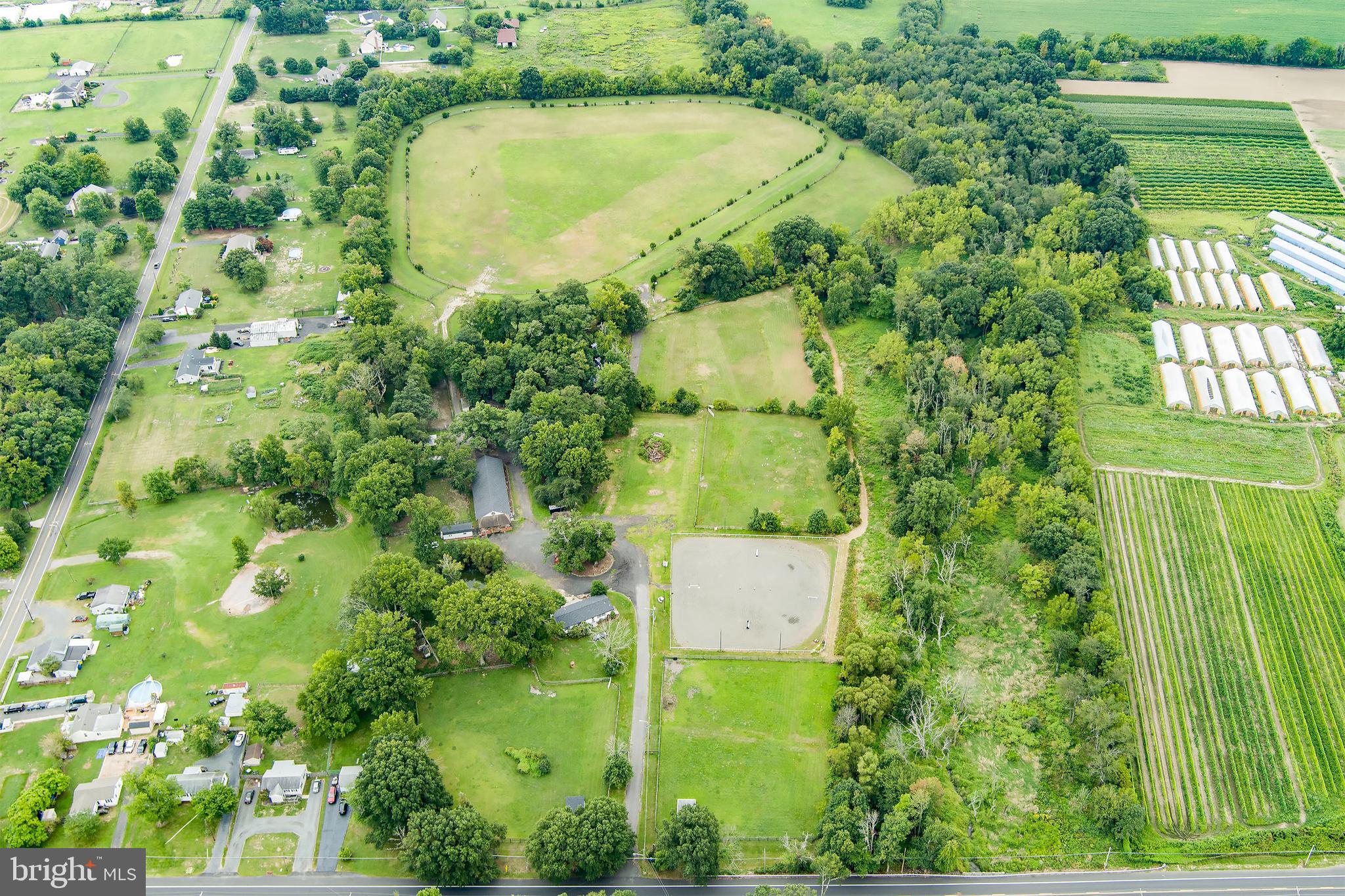 2328 Monmouth Road Jobstown, NJ 08041 - Photo 53 of 54 a view of a garden with a fountain