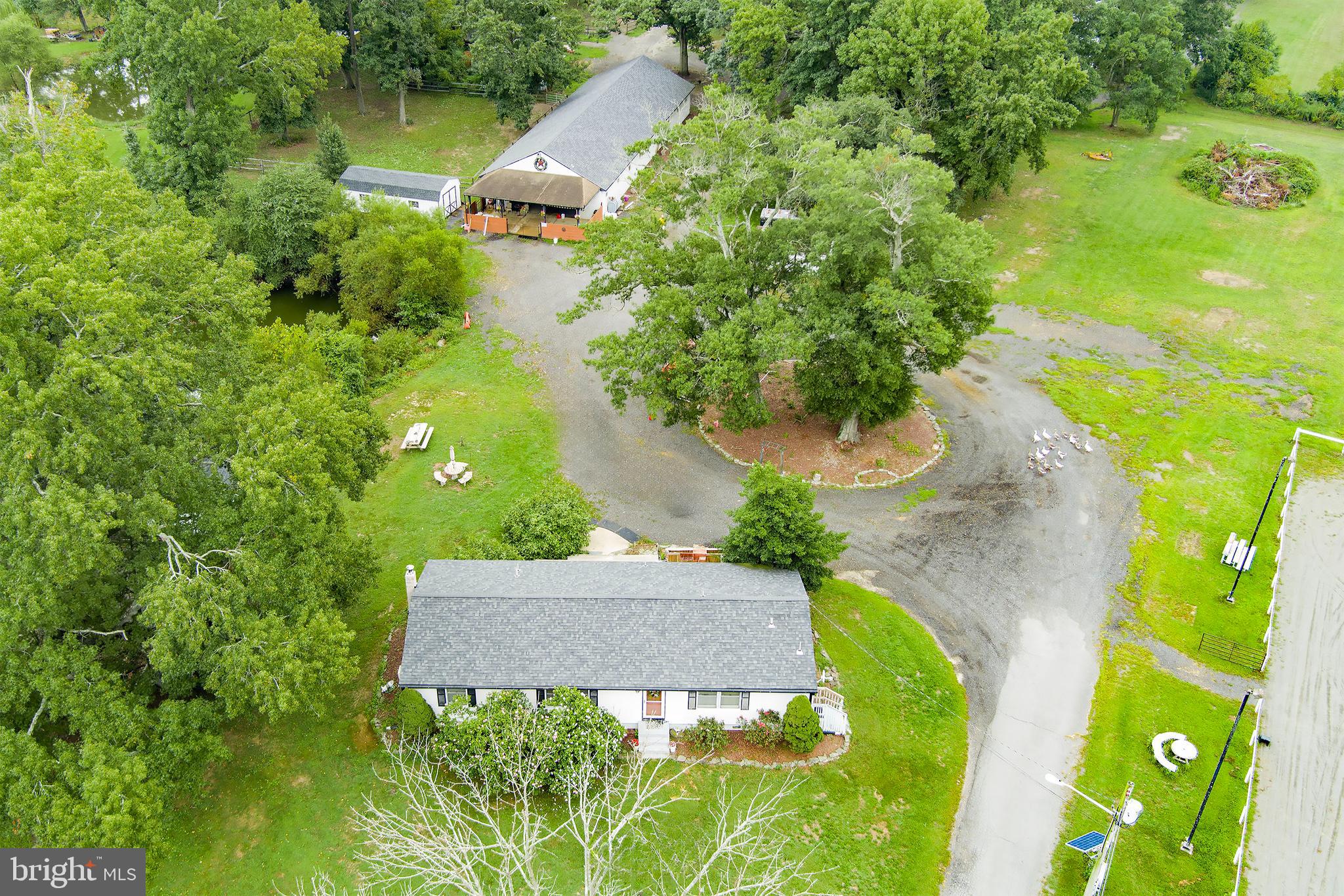 2328 Monmouth Road Jobstown, NJ 08041 - Photo 6 of 54 an aerial view of a house with a yard basket ball court and outdoor seating