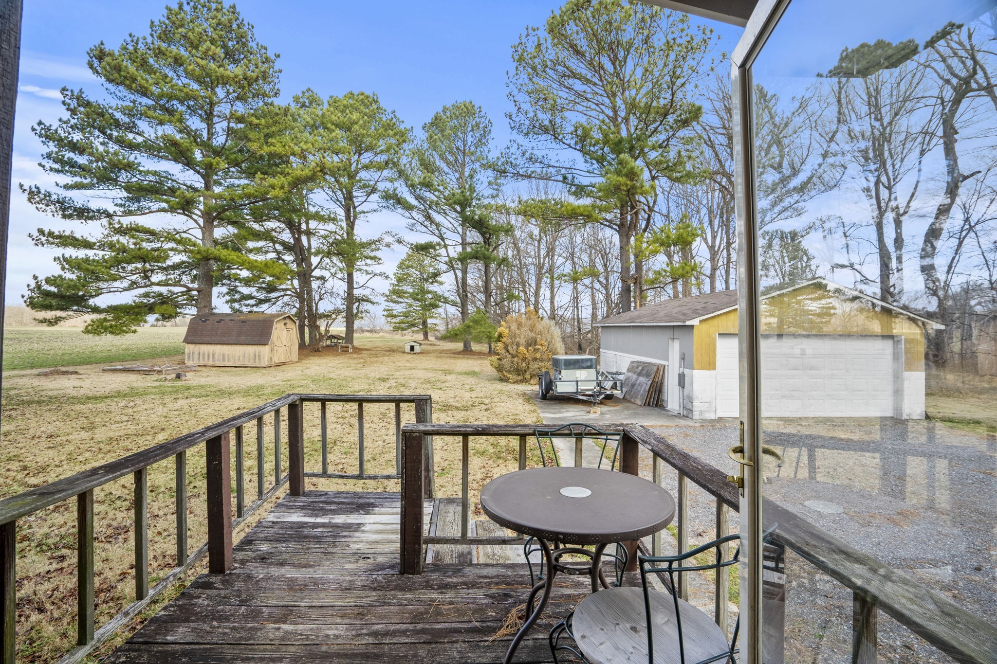 2246 Friendship Road Cross Plains, TN 37049 - Photo 11 of 43 a balcony with table and chairs