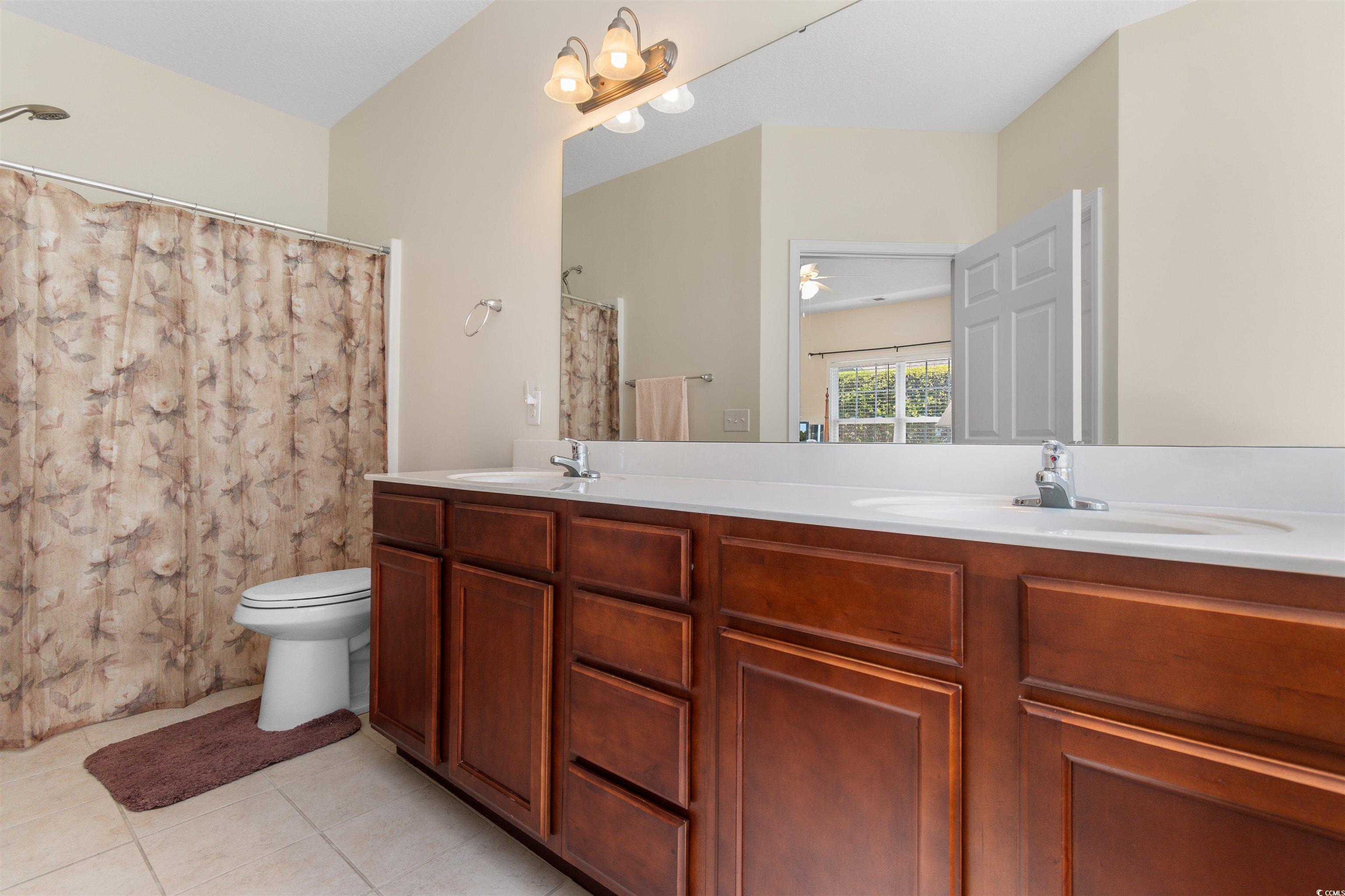 1000 Red Sky Lane, Unit 101 Murrells Inlet, SC 29576 - Photo 13 of 40 Full bathroom with tile patterned flooring, double