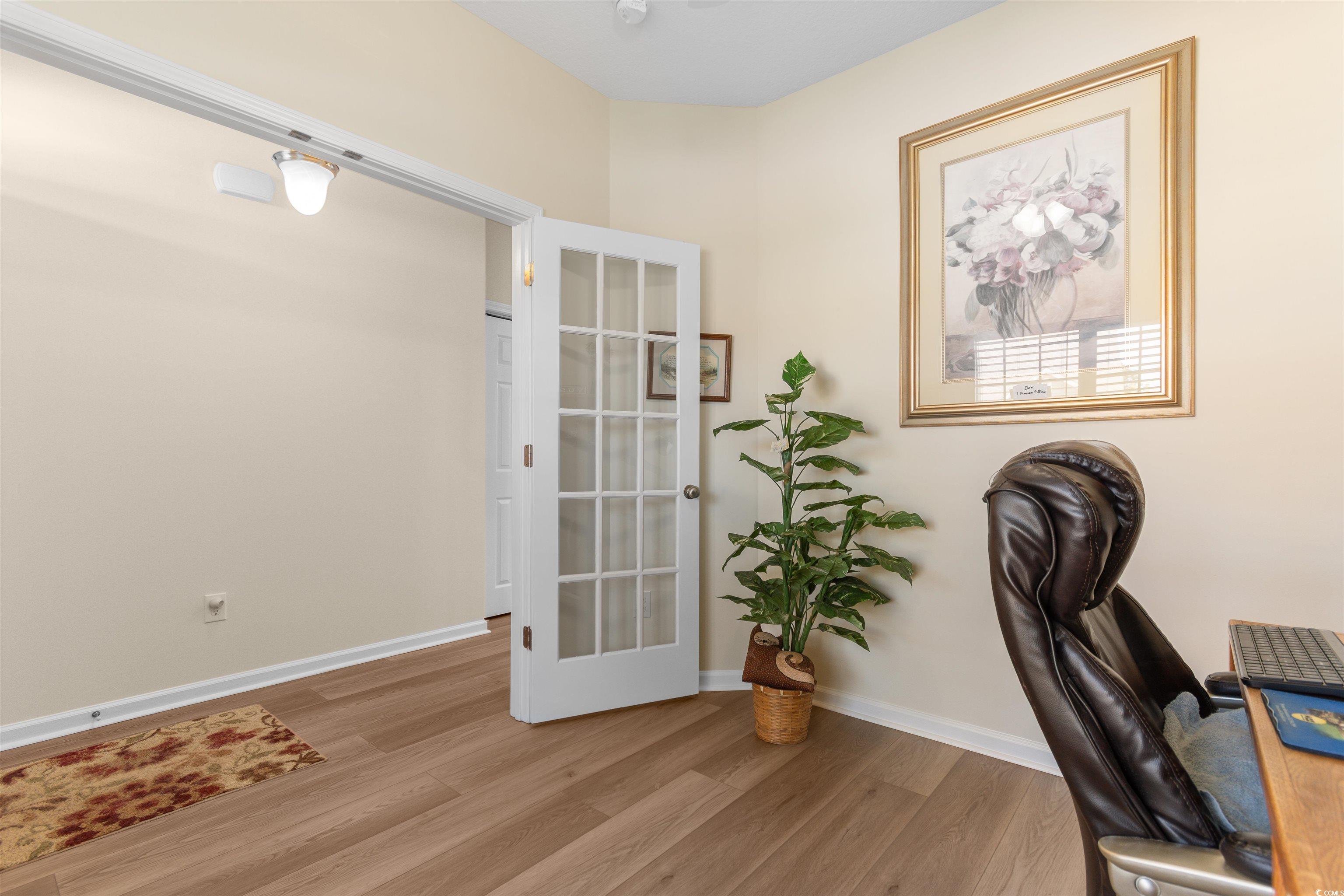 1000 Red Sky Lane, Unit 101 Murrells Inlet, SC 29576 - Photo 21 of 40 Home office with baseboards and wood finished floo