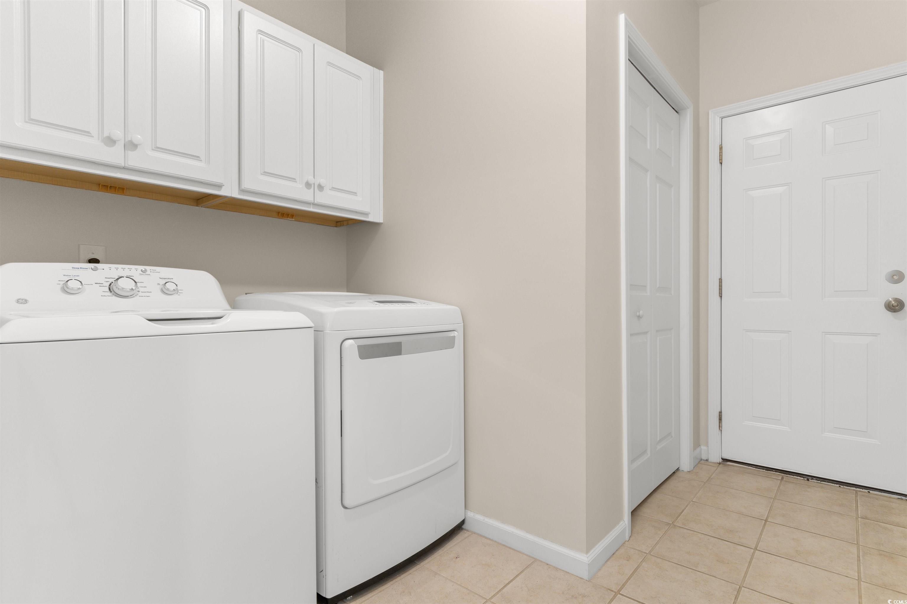 1000 Red Sky Lane, Unit 101 Murrells Inlet, SC 29576 - Photo 22 of 40 Laundry room with cabinet space, baseboards, washe