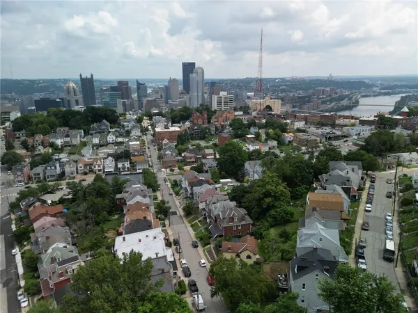 an aerial view of a city with lots of residential buildings