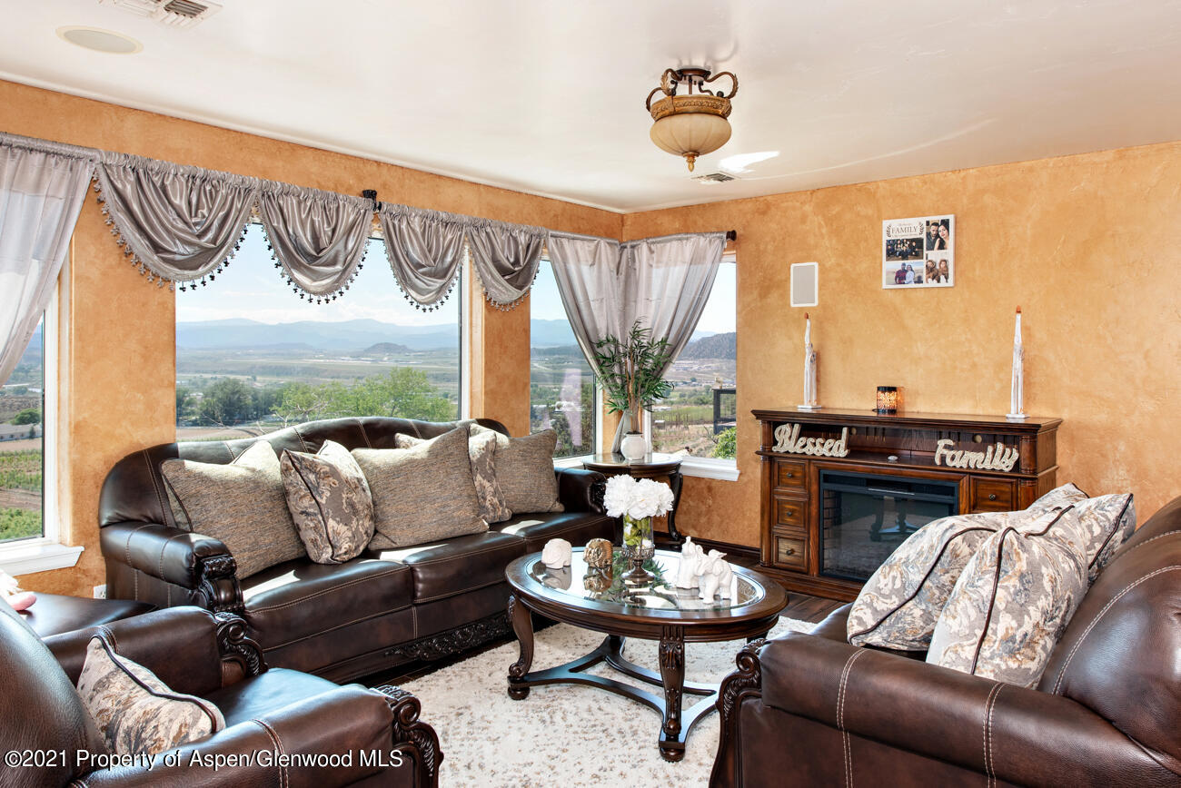 1090 Hickory Drive Rifle, CO 81650 - Photo 4 of 27 a living room with furniture and a large window