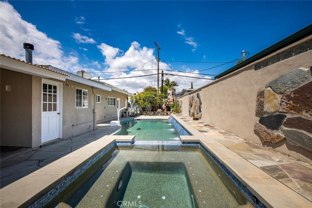 1238 North Studebaker Road Long Beach, CA 90815 - Photo 31 of 47 a view of a backyard with sitting area