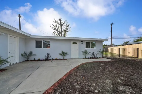 a front view of a house with a space