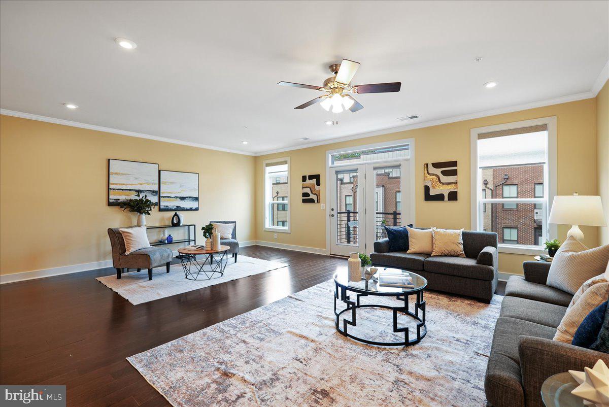 1658 Bandit Loop, Unit 2B Reston, VA 20190 - Photo 3 of 43 Living room has recessed lighting & stylish trim.
