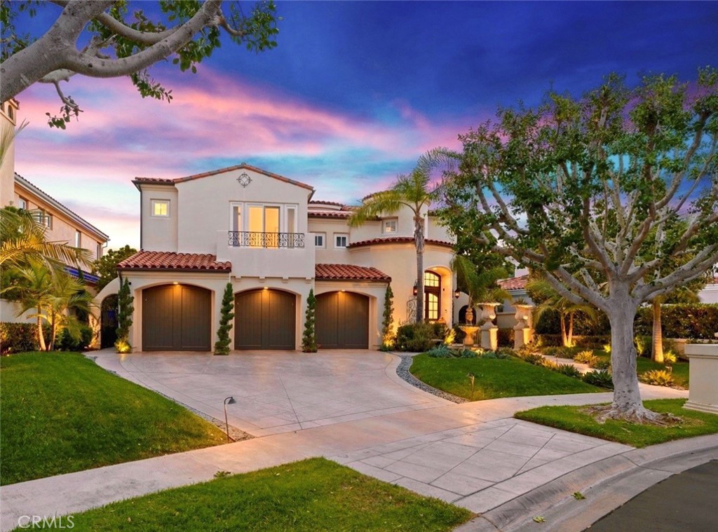 4 Peninsula Newport Coast, CA 92657 - Photo 1 of 20 a front view of a house with a yard