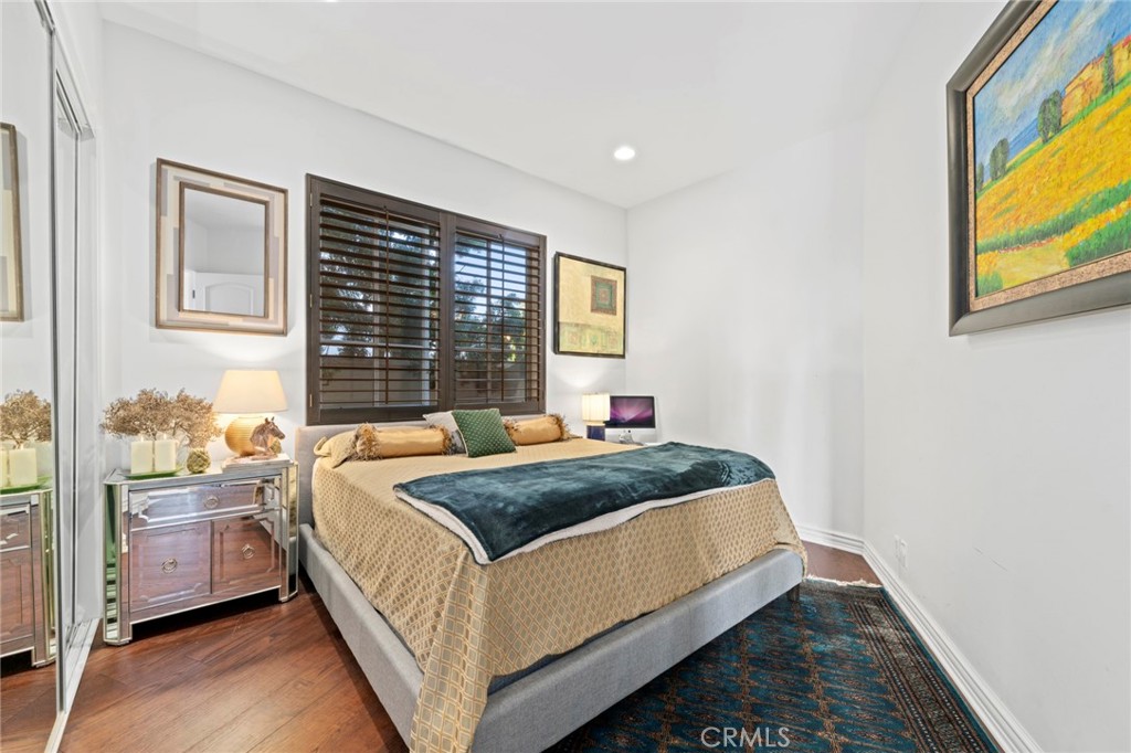 4 Peninsula Newport Coast, CA 92657 - Photo 15 of 20 a bedroom with a bed and windows