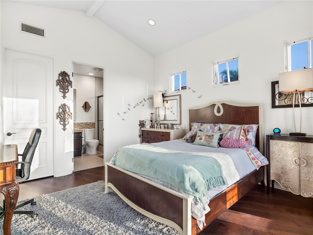 4 Peninsula Newport Coast, CA 92657 - Photo 16 of 20 a bedroom with a bed and a dresser