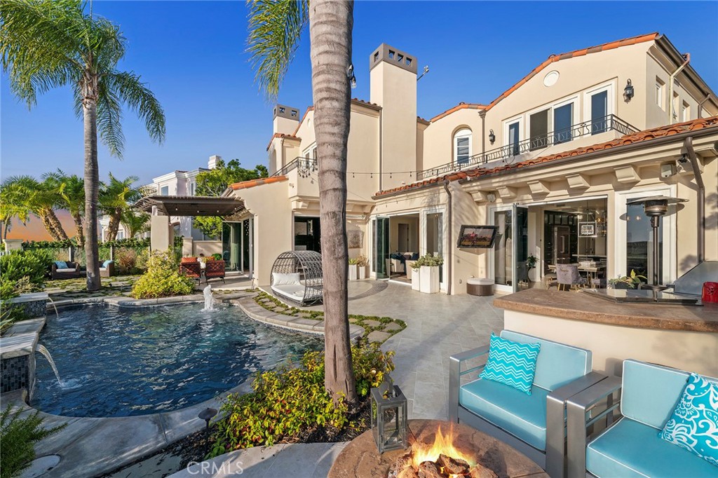 4 Peninsula Newport Coast, CA 92657 - Photo 17 of 20 front view of a house with a yard