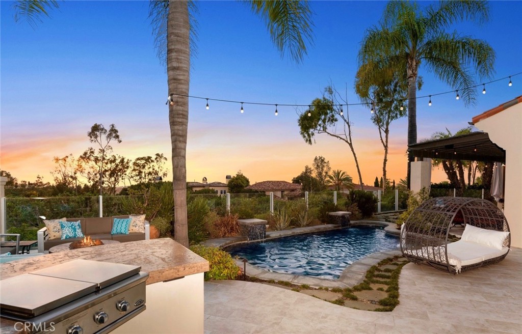 4 Peninsula Newport Coast, CA 92657 - Photo 3 of 20 a view of a backyard patio and swimming pool