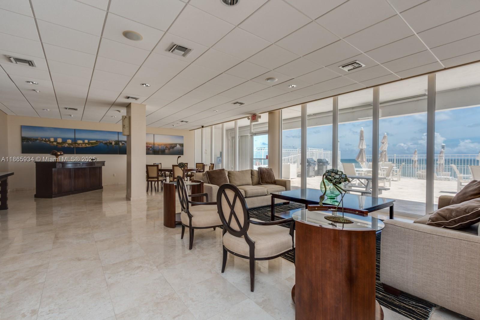 1200 South Ocean Boulevard, Unit 17F Boca Raton, FL 33432 - Photo 51 of 61 CLUB ROOM OVERLOOKING THE POOL & OCEAN