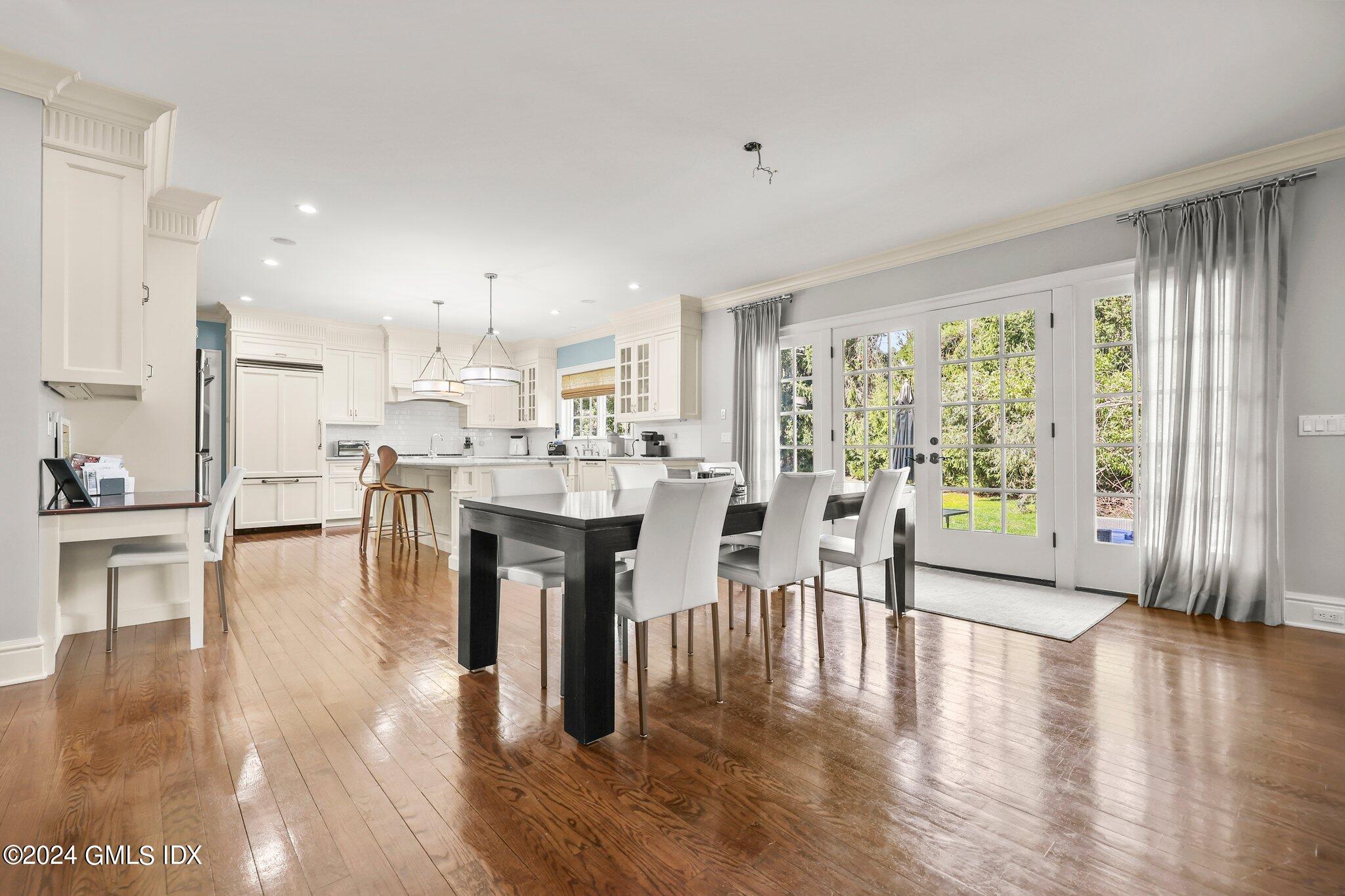 6 Coachlamp Lane Greenwich, CT 06830 - Photo 11 of 33 a living room with furniture and a large window