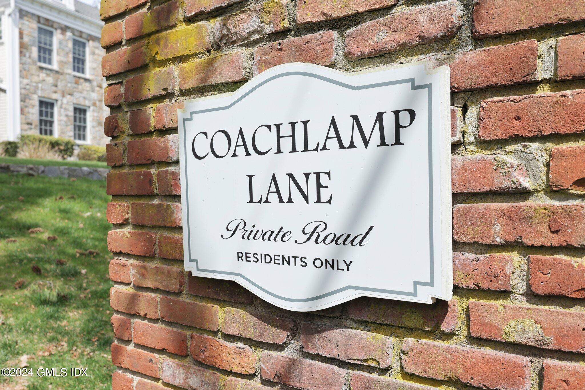 6 Coachlamp Lane Greenwich, CT 06830 - Photo 28 of 33 a sign on the side of a building