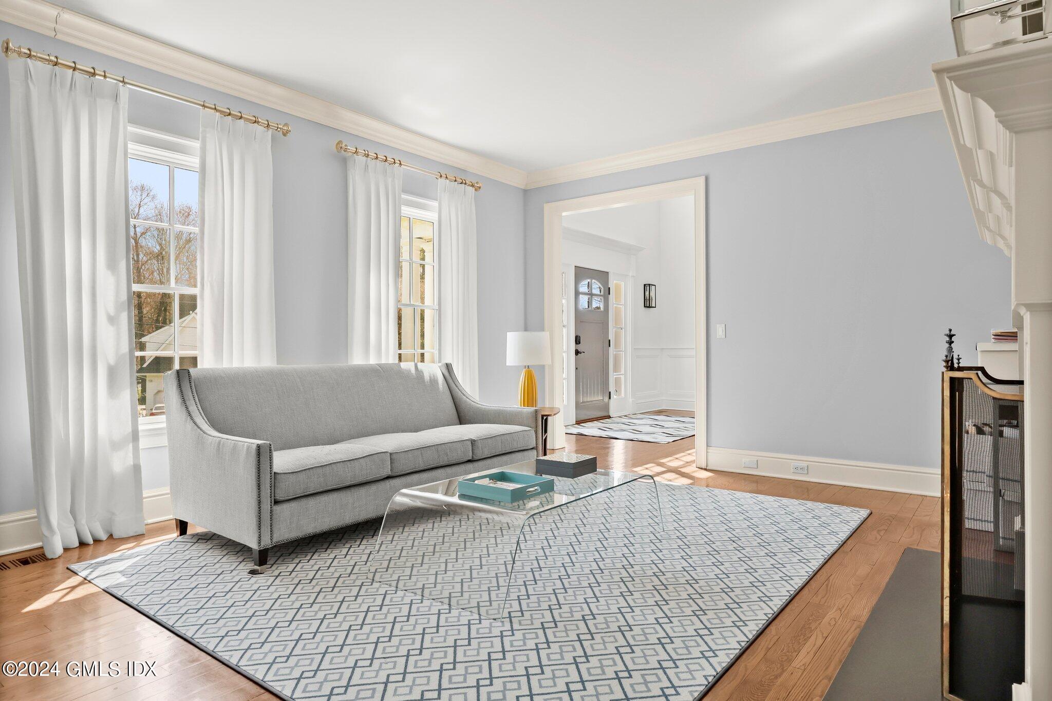 6 Coachlamp Lane Greenwich, CT 06830 - Photo 5 of 33 a living room with furniture and a rug