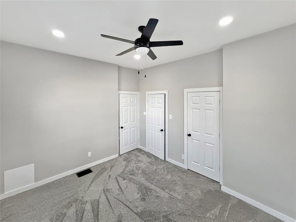 5530 Reiger Avenue, Unit 5528 Dallas, TX 75214 - Photo 14 of 40 wooden floor in an empty room