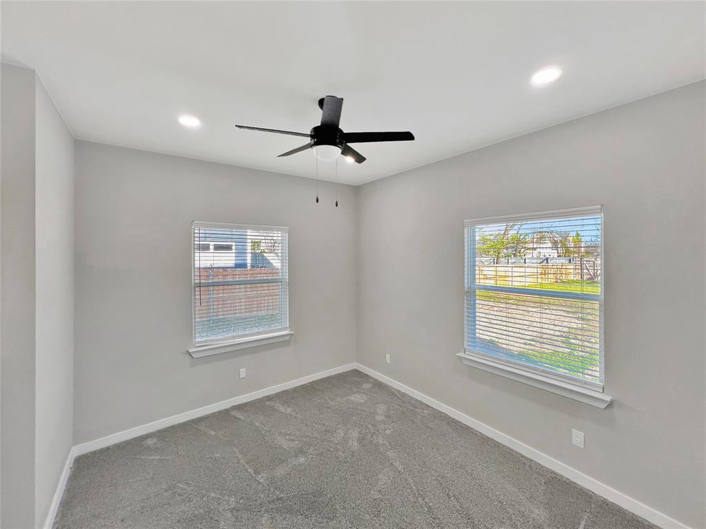 5530 Reiger Avenue, Unit 5528 Dallas, TX 75214 - Photo 10 of 40 a view of an empty room with a window