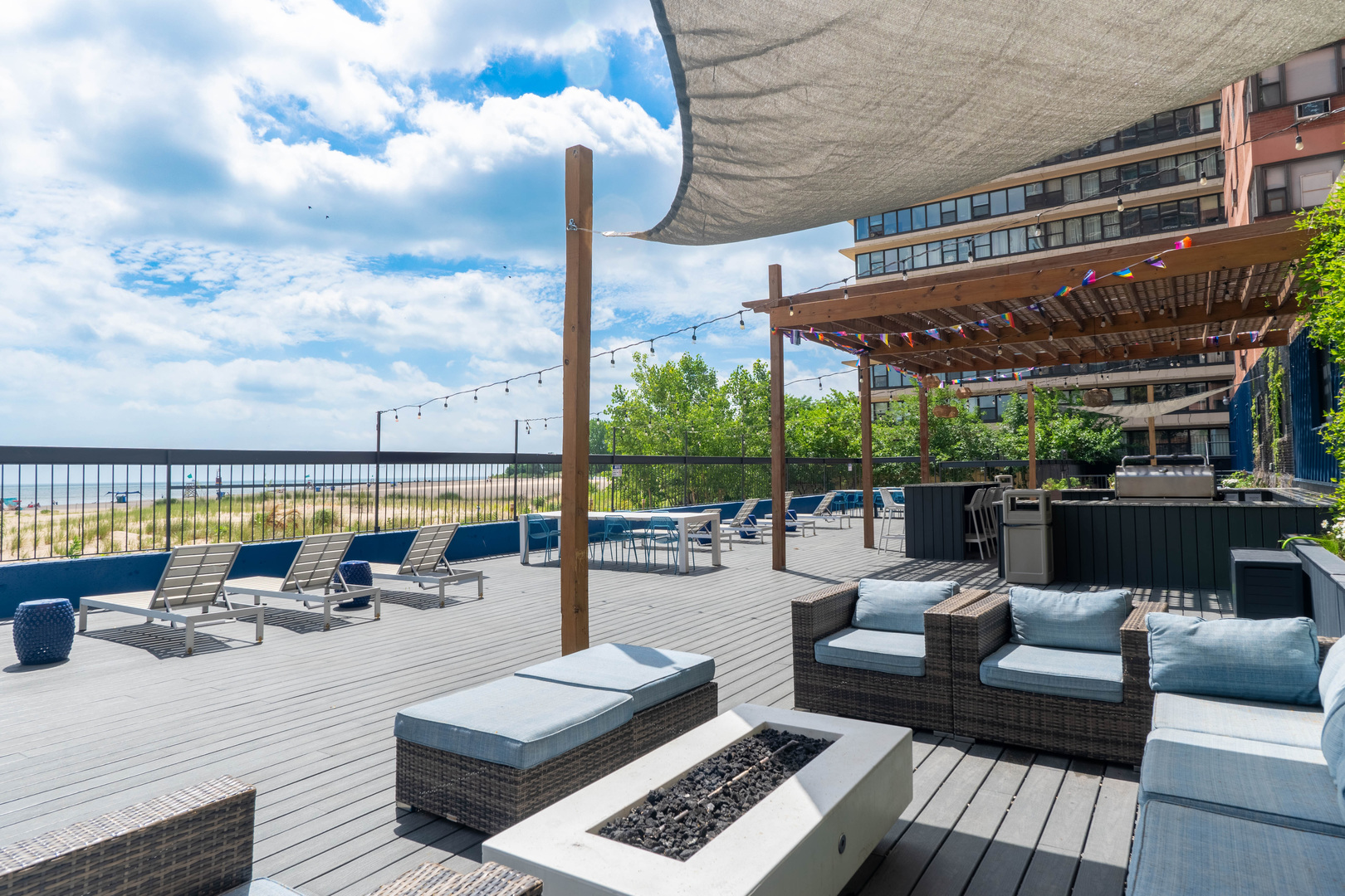 5815 North Sheridan Road, Unit 1103 Chicago, IL 60660 - Photo 6 of 12 a view of a terrace with couches and pool