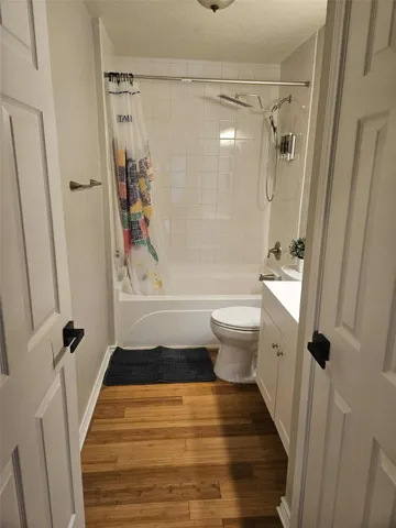 a view of a dining room with furniture and window