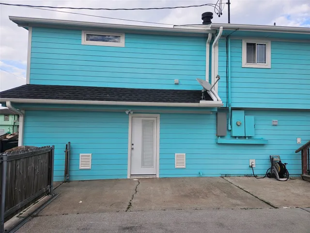 a view of a swimming pool with an outdoor seating