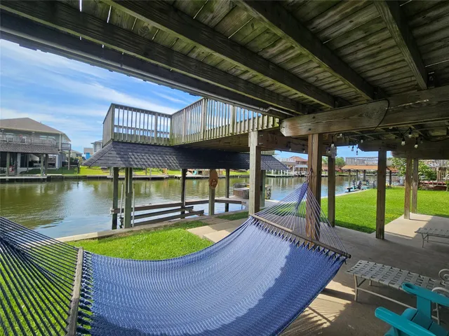 a view of a swimming pool with a porch