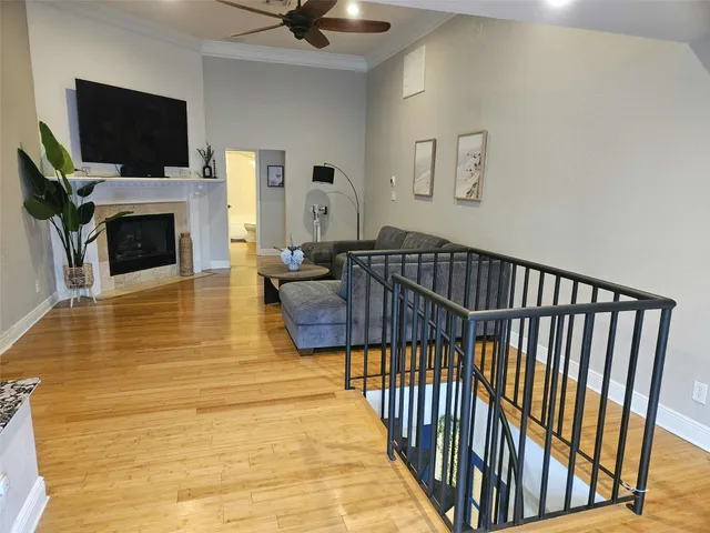 a bedroom with a bed and a night stand