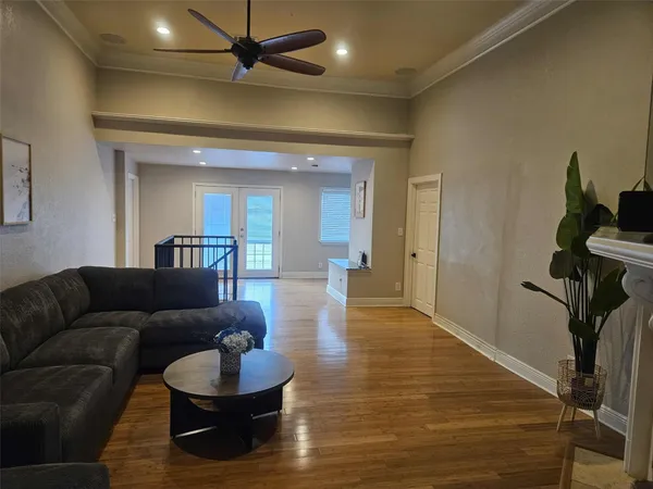 a bedroom with a bed and a table