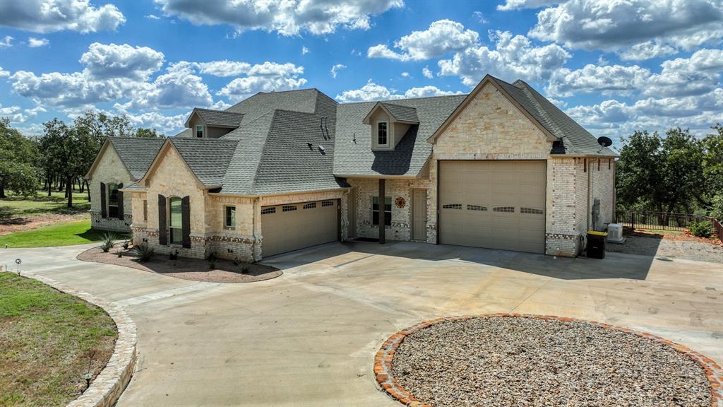1320 Post Oak Road Gordon, TX 76453 - Photo 2 of 40 a view of a house with a yard