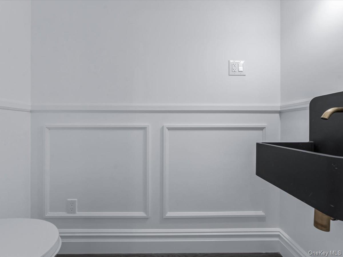 753 Hancock Street, Unit HSE Brooklyn, NY 11233 - Photo 20 of 46 a bathroom with a shower and toilet