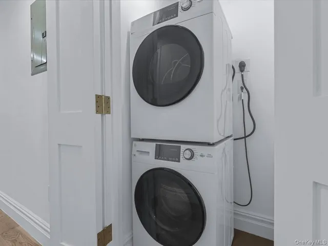 a utility room with dryer and washer