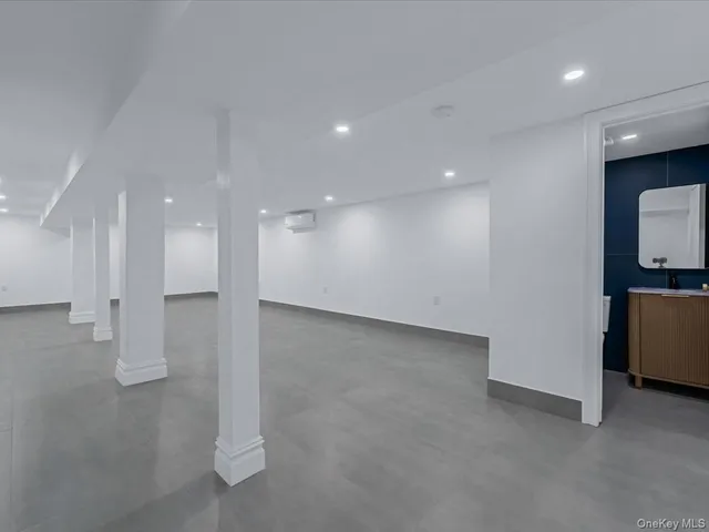 a view of a hallway with stairs