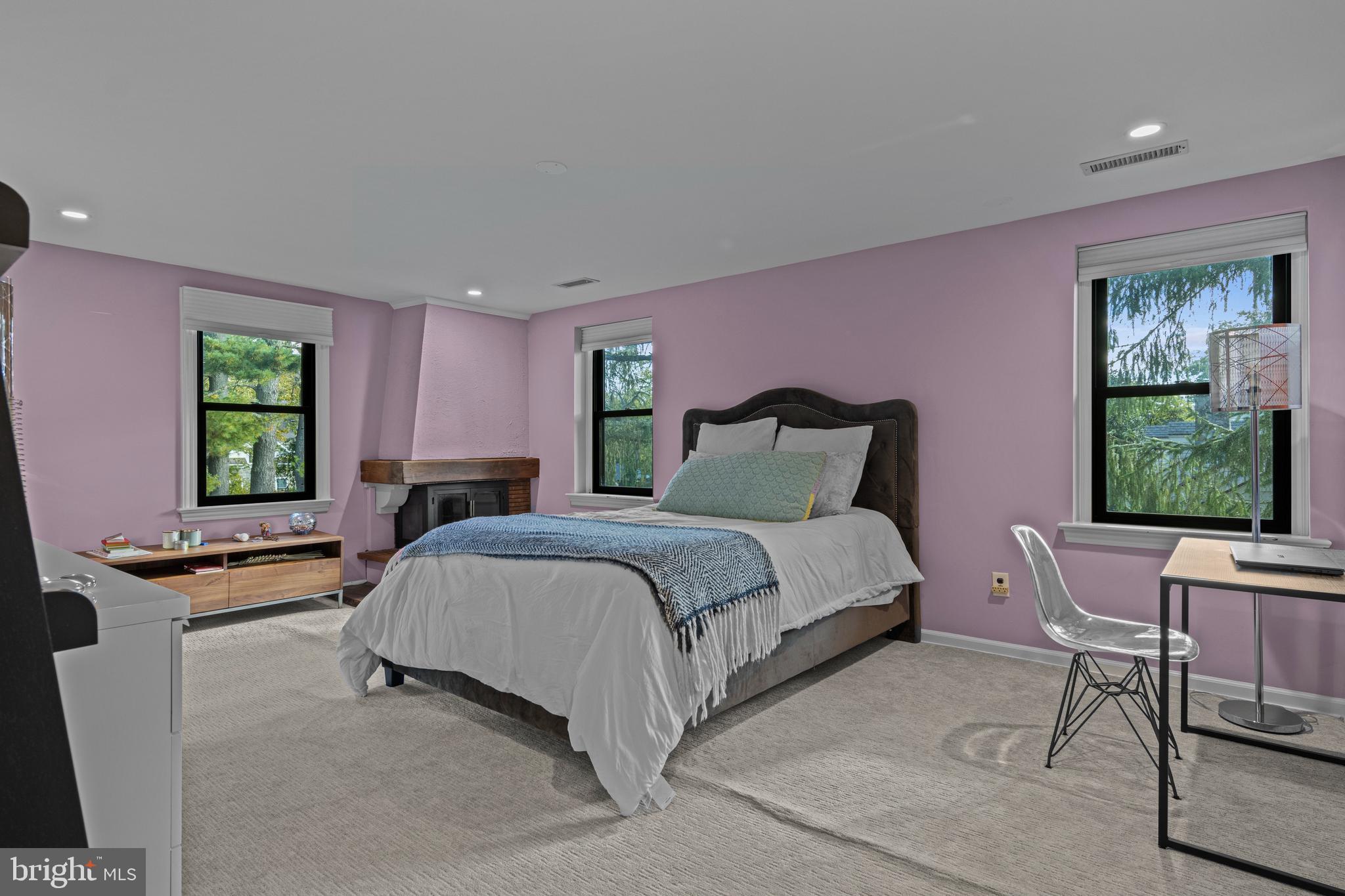 518 Fairview Road Penn Valley, PA 19072 - Photo 21 of 53 a bedroom with a bed and large windows