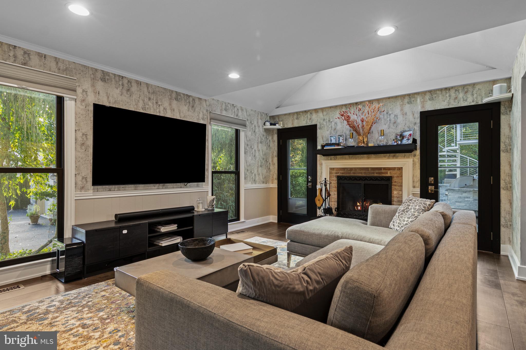 518 Fairview Road Penn Valley, PA 19072 - Photo 8 of 53 a living room with furniture and a flat screen tv