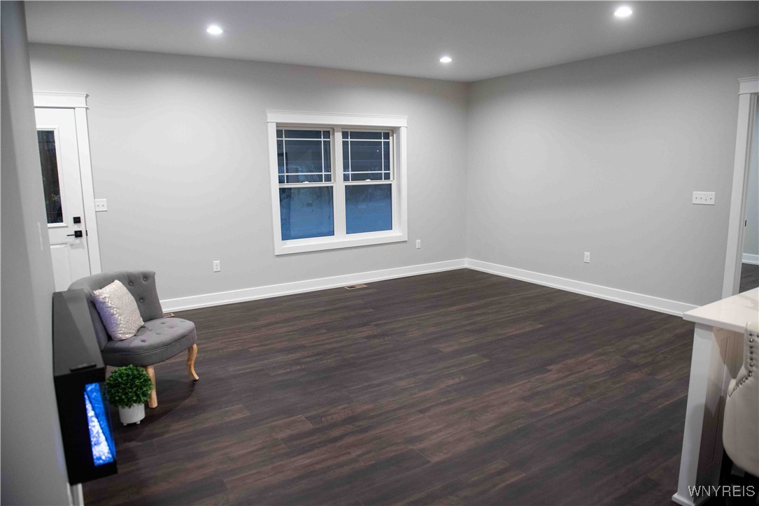 6220 Versailles Road Hamburg, NY 14085 - Photo 20 of 36 GREAT ROOM AREA -OPEN CONCEPT TO KITCHEN AREA