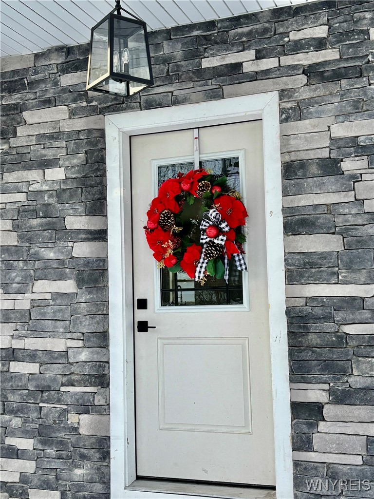 6220 Versailles Road Hamburg, NY 14085 - Photo 2 of 36 LOVELY FRONT DOOR- PRAIRE STYLE WINDOWS