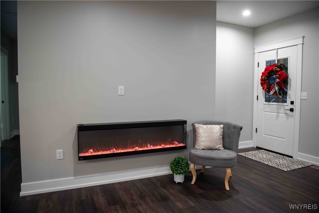 6220 Versailles Road Hamburg, NY 14085 - Photo 22 of 36 TRENDY ELECTRIC FIREPLACE WITH SHIMMERING CRYSTAL