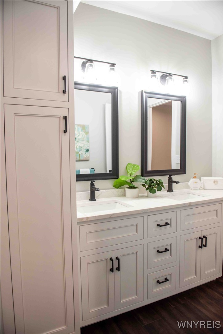 6220 Versailles Road Hamburg, NY 14085 - Photo 27 of 36 CUSTOM VANITY AND LINEN TOWER IN PRIMARY BATHROOM