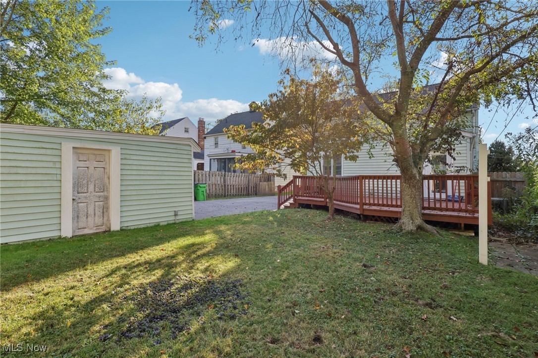 1503 Oakmount Road South Euclid, OH 44121 - Photo 47 of 50 View of yard with a wooden deck and an outbuilding