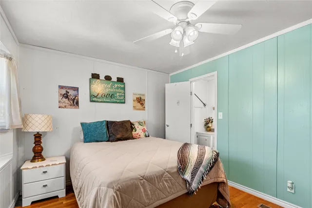 a bathroom with a sink vanity granite and toilet