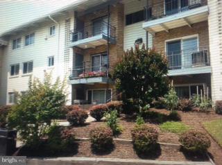11368 Cherry Hill Road, Unit 304 Beltsville, MD 20705 - Photo 1 of 11 a front view of house with yard