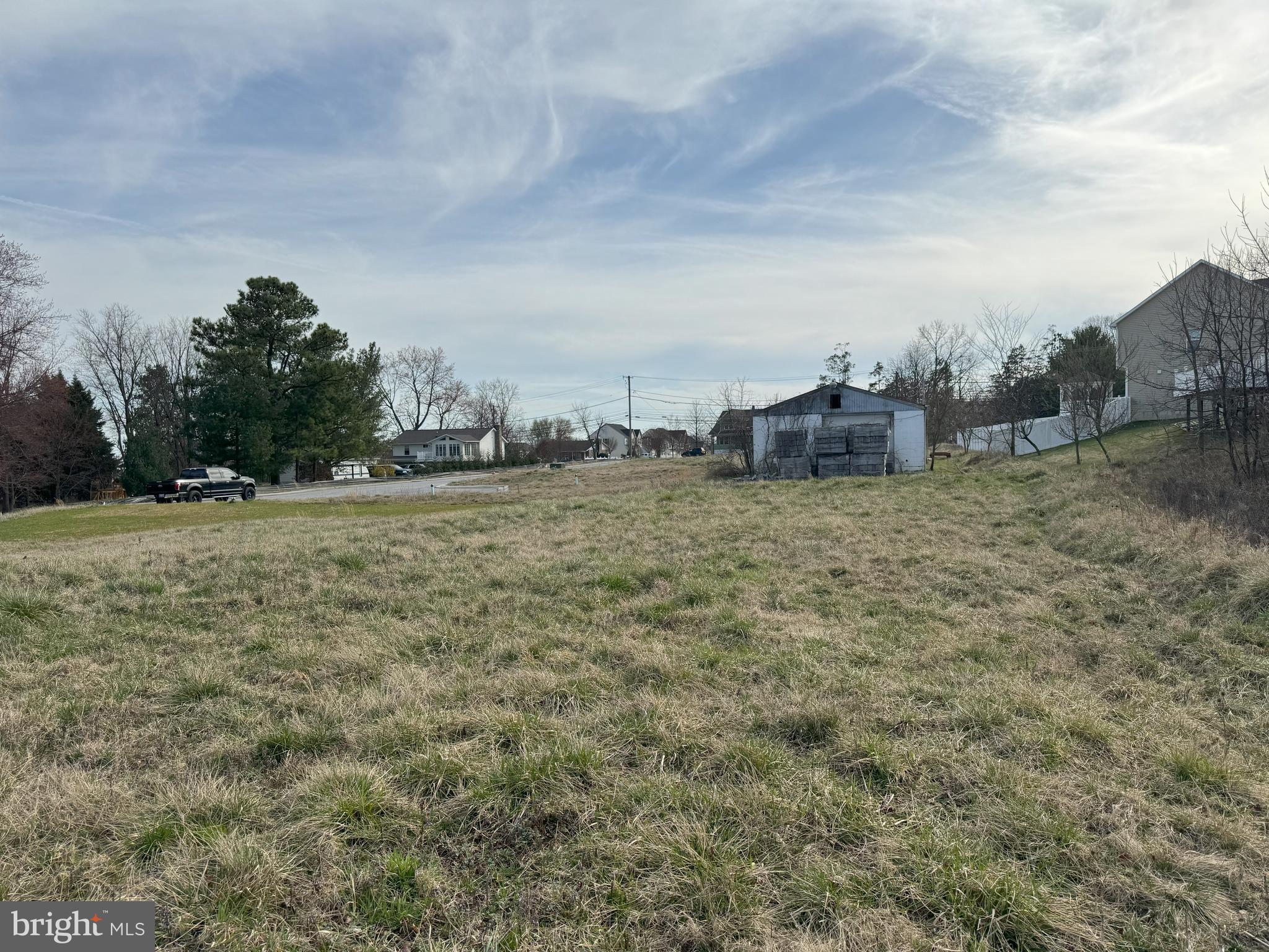 4630 Ridge Road Baltimore, MD 21236 - Photo 18 of 21 a view of a field with trees in the background
