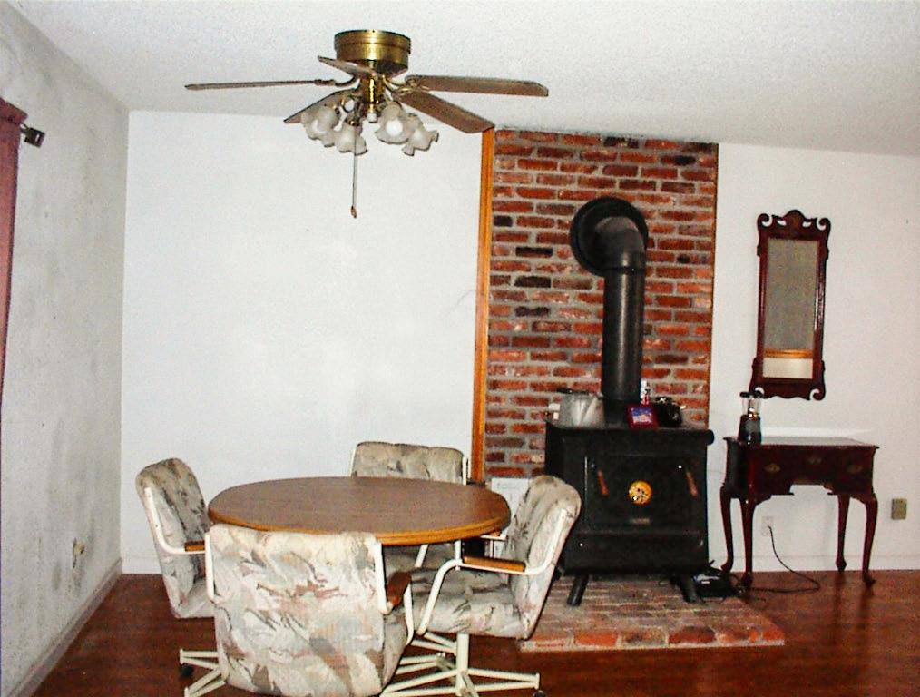50245 Greenhill Road Squaw Valley, CA 93675 - Photo 15 of 25 a view of a dining room with furniture and wooden floor