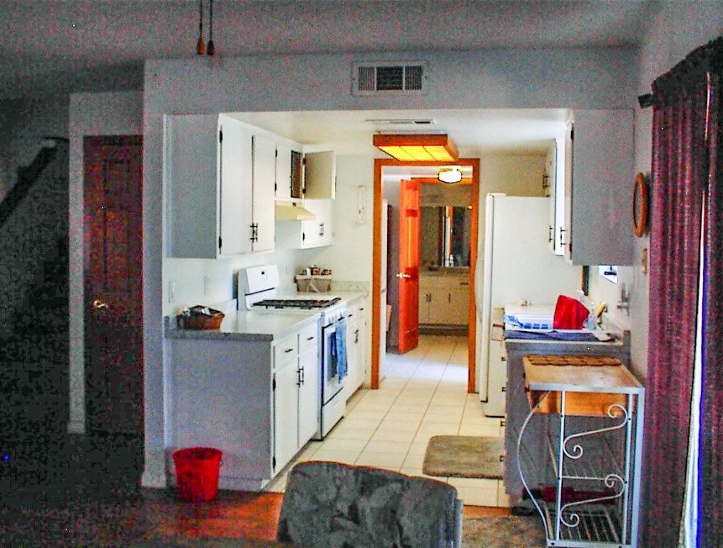 50245 Greenhill Road Squaw Valley, CA 93675 - Photo 17 of 25 a kitchen view with granite countertop a sink and cabinets