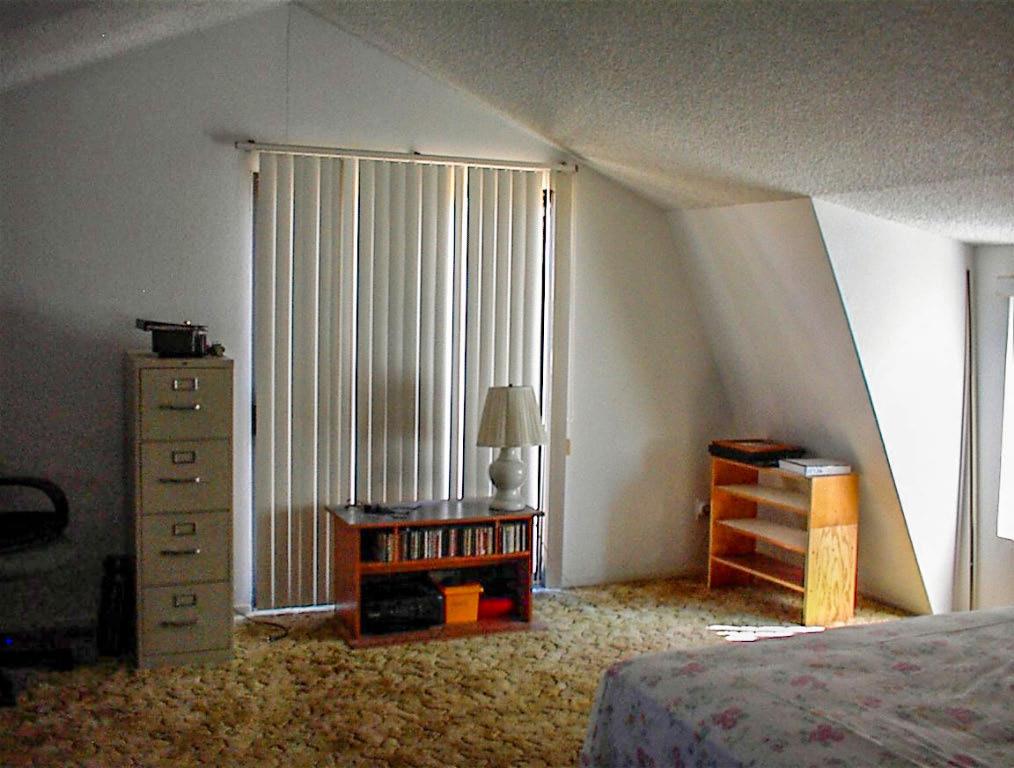 50245 Greenhill Road Squaw Valley, CA 93675 - Photo 22 of 25 a bedroom with bed and a window