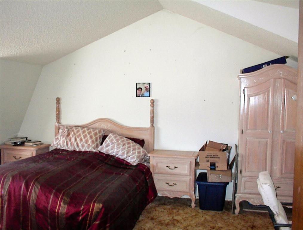 50245 Greenhill Road Squaw Valley, CA 93675 - Photo 23 of 25 a bedroom with a bed and two windows