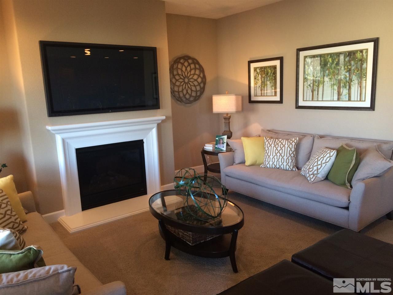 1840 Wind Walker Drive Reno, NV 89521 - Photo 1 of 11 a living room with furniture and a fireplace