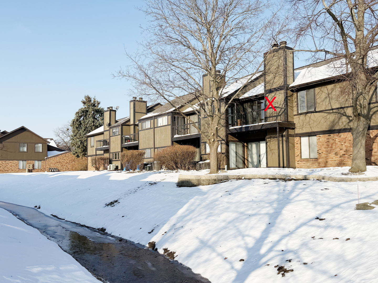 22 Creekside Circle, Unit D Elgin, IL 60123 - Photo 23 of 23 a front view of a building with street