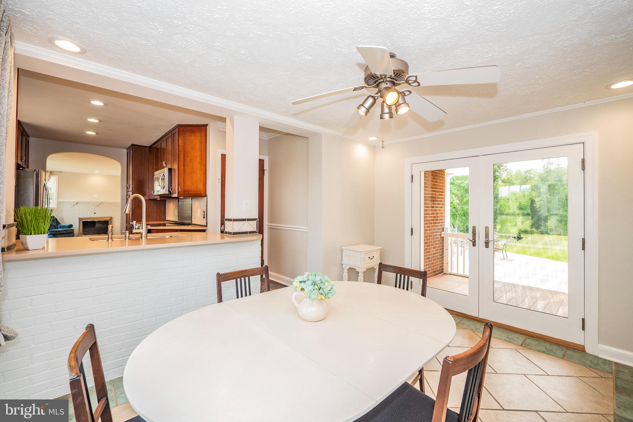 8933 Watkins Road Gaithersburg, MD 20882 - Photo 14 of 65 Main Level - Dining Room w/ Walk-out to Rear Deck