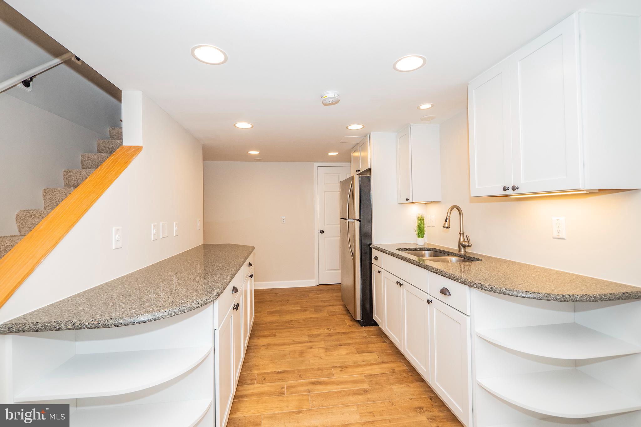 8933 Watkins Road Gaithersburg, MD 20882 - Photo 45 of 65 Lower Level - Kitchenette w/ Granite Counters